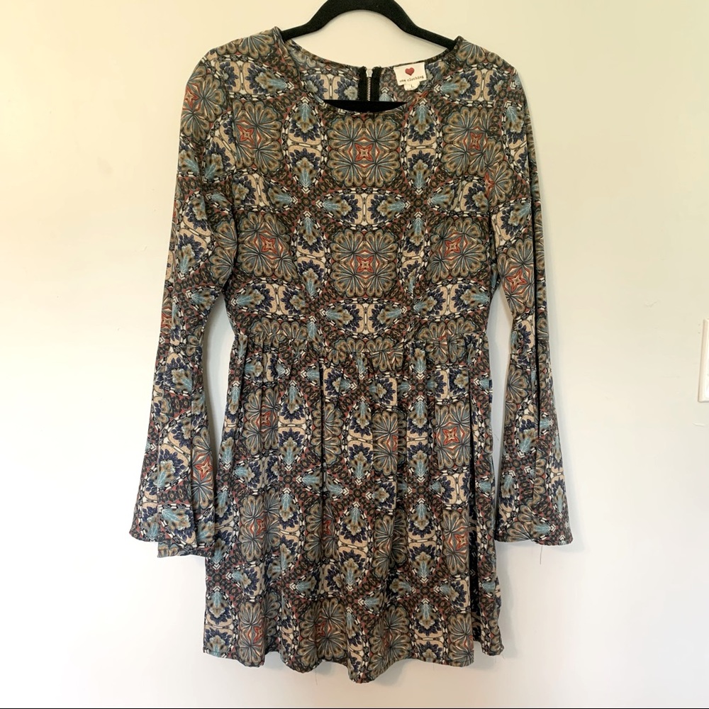Boho hippie long sleeve mini dress. Lovely multi earth tone color print.